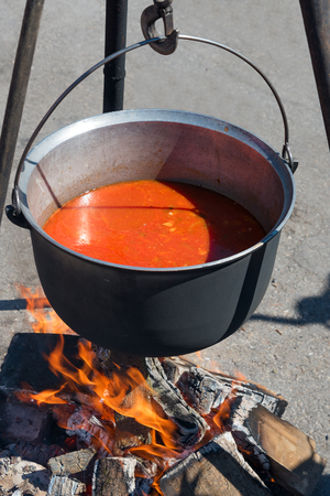 Soup cooking on fire.の写真素材