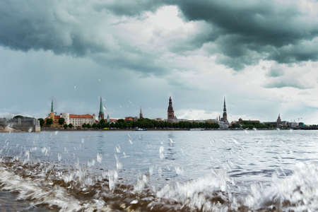 Riga city skyline across river Daugava, Latvia.の写真素材