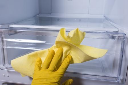 Hand cleaning refrigerator.の写真素材