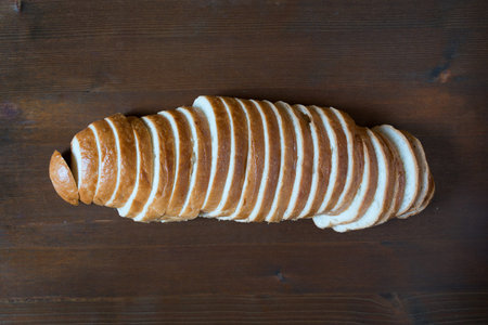 Sliced bread on table.