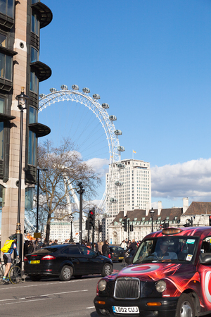 LONDON, UK -  MARCH 8, 2014 : Londoners and tourists rushes in their daily routine in the city center.のeditorial素材