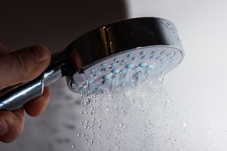 Shower head and splashing water.の写真素材