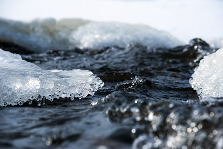 Ice formation in water stream.