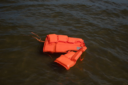 Floating life jacket in sea water.