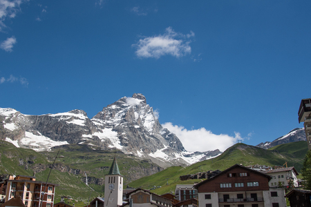 Mount Matterhorn and Cervinia city roofs, Italy.の写真素材