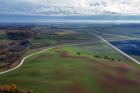 Fields and roads in autumn time.の写真素材