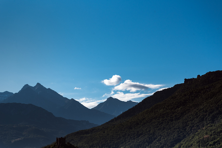 Mountain peaks and sky in Alps, Italy.の写真素材