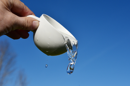 White cup and transparent water.の写真素材