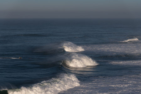 Atlantic ocean waves at Portugal coast next to Nazare city.