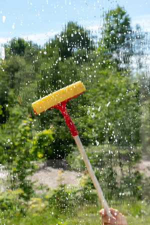Washing of window.の写真素材