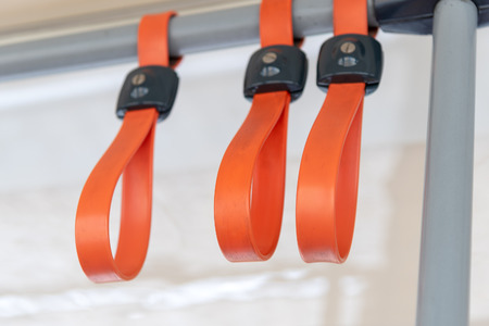 Grip holders in the tram.の写真素材