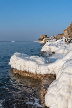 Ice on abandoned military fortifications on Baltic sea coast near Liepaja, Latvia.の写真素材