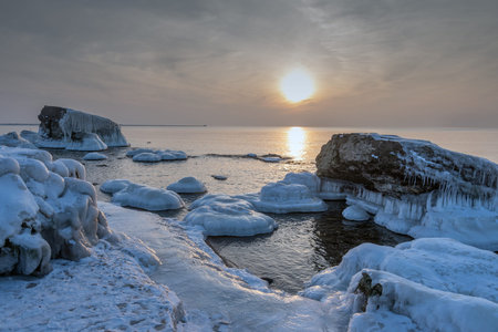 Ice on abandoned military fortifications on Baltic sea coast near Liepaja, Latvia.