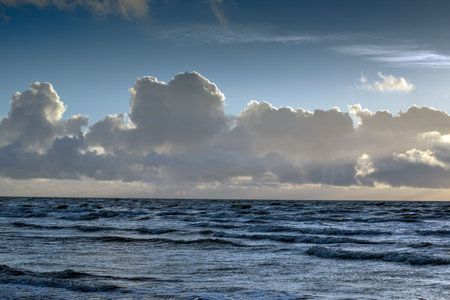 Clouds above Baltic sea in sunset time.