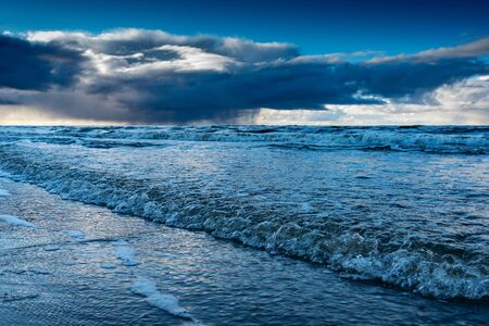 Dark clouds over Baltic sea at Liepaja, Latvia.の写真素材