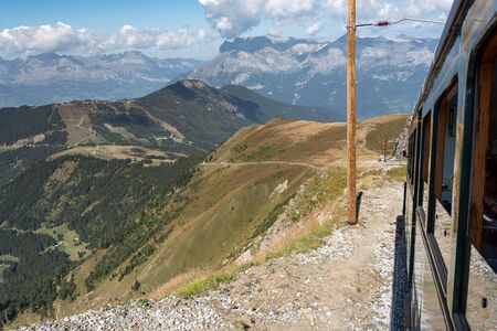 Mont Blanc Tramway in alpine landscape - highest rack railway train in France.の写真素材