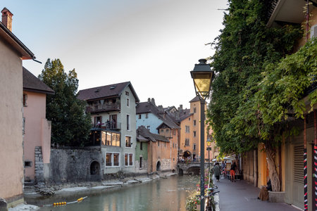 ANNECY, FRANCE - SEPTEMBER 13, 2019 : sun is setting in downtown of Annecy, nicknamed the "Pearl of French Alps".のeditorial素材