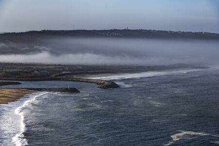 Morning time at Atlantic ocean in Nazare city, Portugal.の写真素材