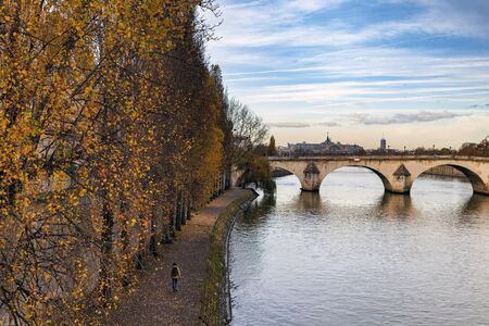 Autumn day in Paris  by Seine river , France.の写真素材
