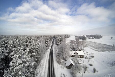 Fresh snow in countryside of Latvia.の写真素材