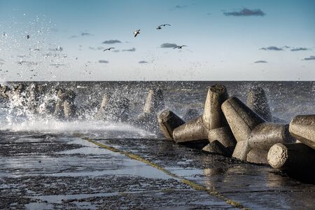 Liepaja port north mole in stormy day, Latvia.の写真素材