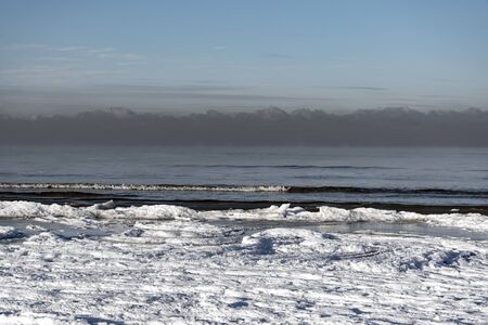 Snowy coast of Baltic sea in winter.の写真素材