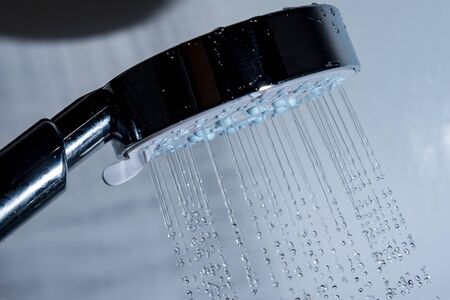 Shower head and falling water.の写真素材