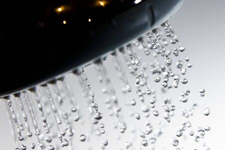 Water drops and shower head.の写真素材