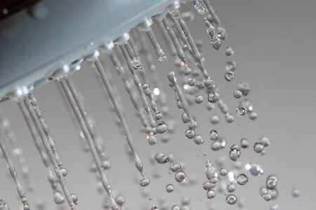 Water drops and shower head.の写真素材