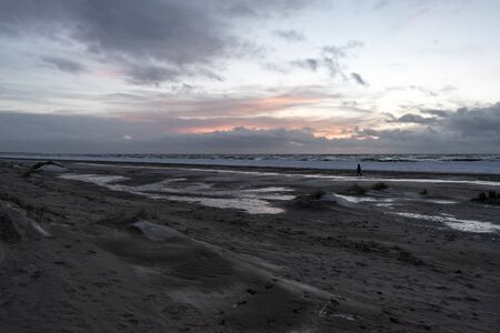 Icy baltic sea coast in winter next to Liepaja, Latvia.の写真素材