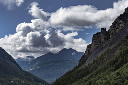 Alpine summits near Mont Blanc in clouds, Italy side.の写真素材