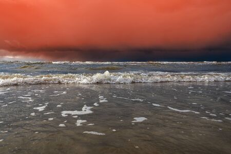 Stormy clouds over Baltic sea.の写真素材