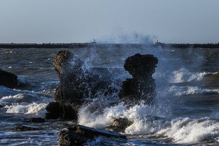 Remains of military fortifications in stormy Baltic sea near Liepaja, Latvia.の写真素材