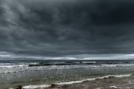 Dark clouds over Baltic sea.の写真素材