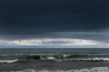 Dark clouds over Baltic sea.の写真素材
