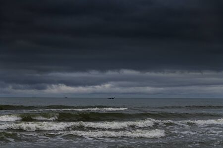 Dark clouds over Baltic sea.の写真素材