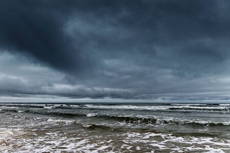 Dark clouds over Baltic sea.の写真素材