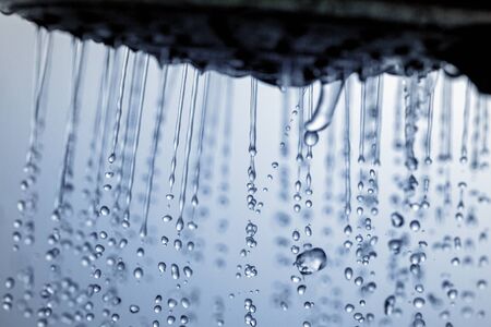 Shower head and falling water drops.の写真素材