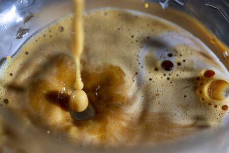 Fresh coffee in transparent cup.の写真素材