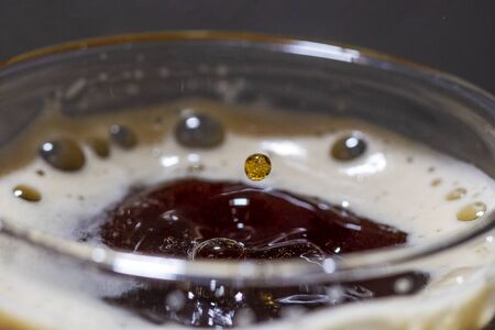 Fresh coffee in transparent cup.の写真素材