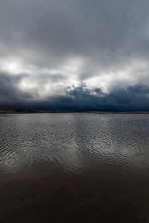 Dark clouds over Baltic sea.の写真素材