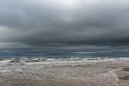 Dark clouds over Baltic sea.の写真素材