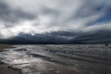 Dark clouds over Baltic sea.の写真素材