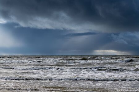 Dark clouds over Baltic sea.の写真素材
