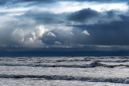 Dark clouds over Baltic sea.の写真素材