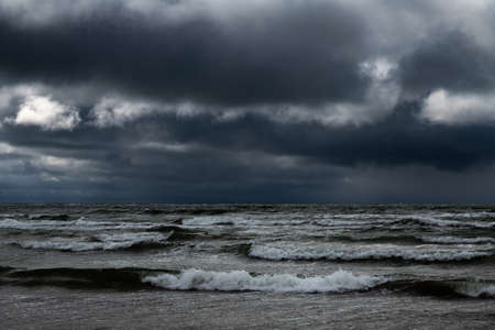 Gray and stormy Baltic sea in spring time.の写真素材