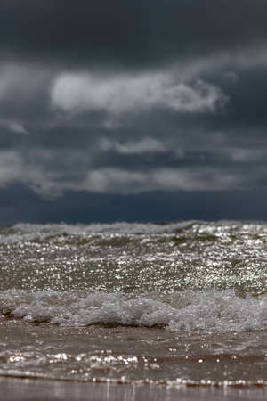Gray and stormy Baltic sea in spring time.の写真素材