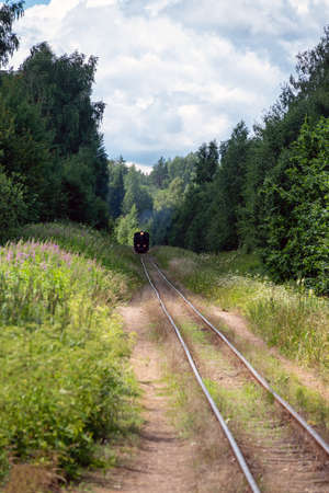 Narrow gauge train with a steam locomotive on the line Gulbene - Aluksne, Latvia.の写真素材