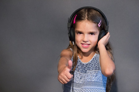 girl music agree thumb upの写真素材