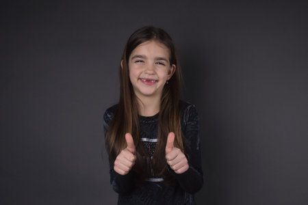 girl positive thumbs upの写真素材